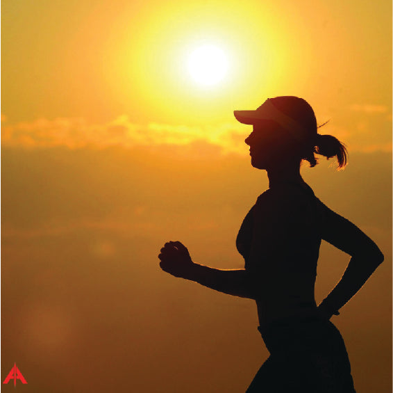 Jogger running at sunset with ALINE Insoles logo in the corner.