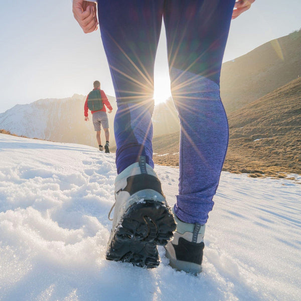 People hiking in snow.