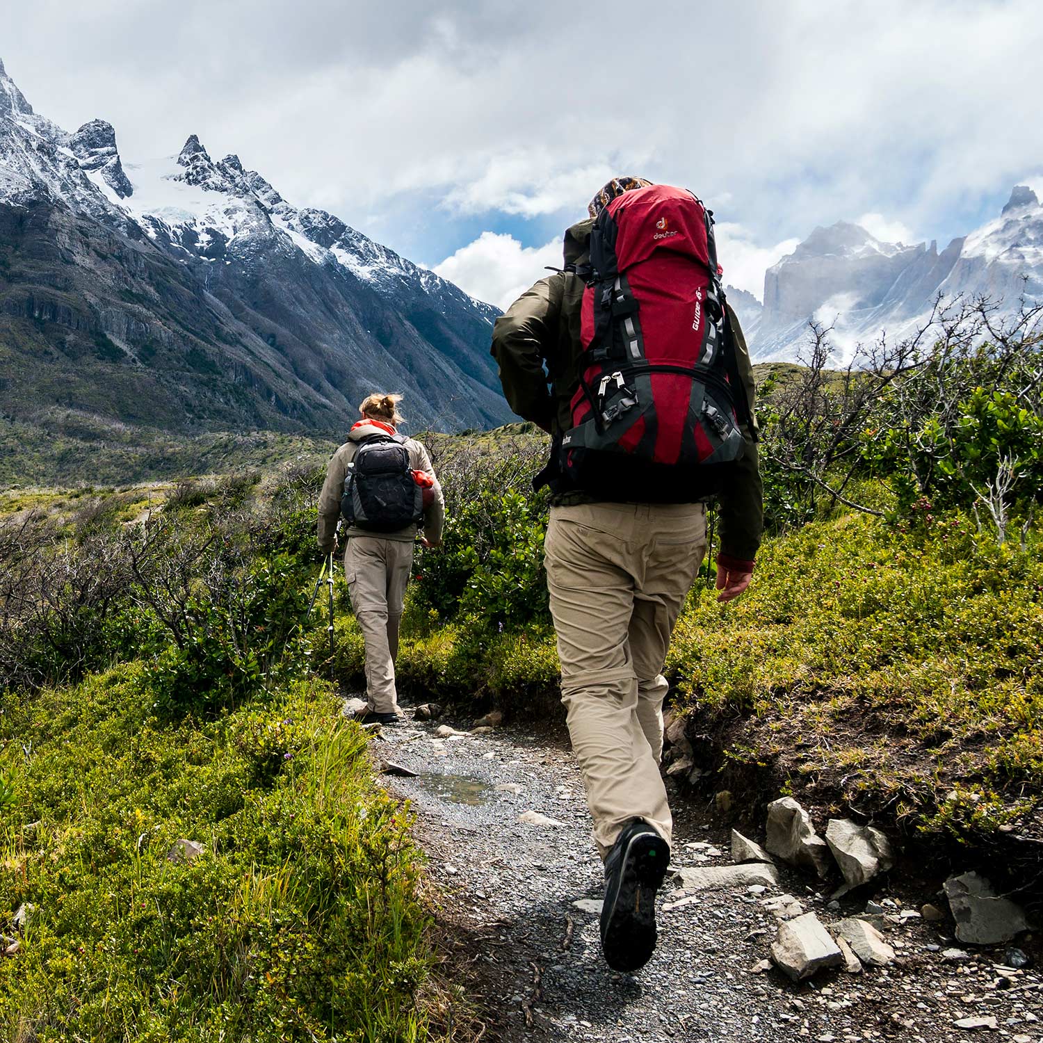 People hiking in cold climate.