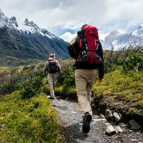 People hiking in cold climate.