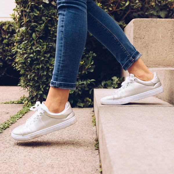 Person walking down stairs.