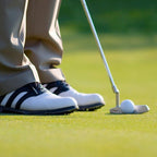 Golfer putting.